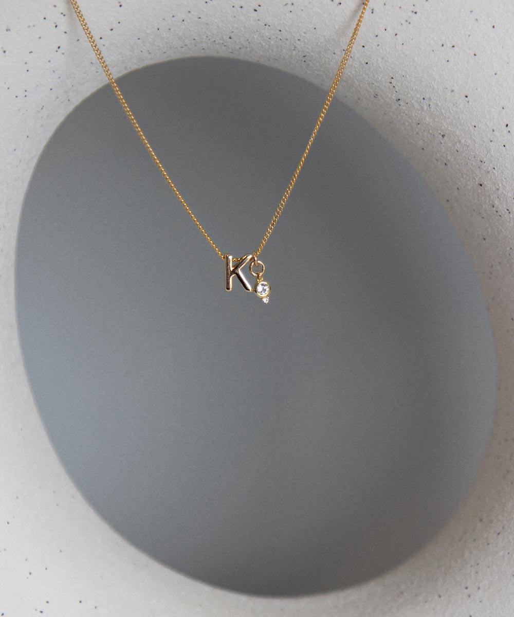 K Initial with April Birthstone Charm Necklace.