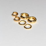 Star Studded Cosmic Celestial Hoop Earrings from the Maison de Femmes Galaxia Collection.