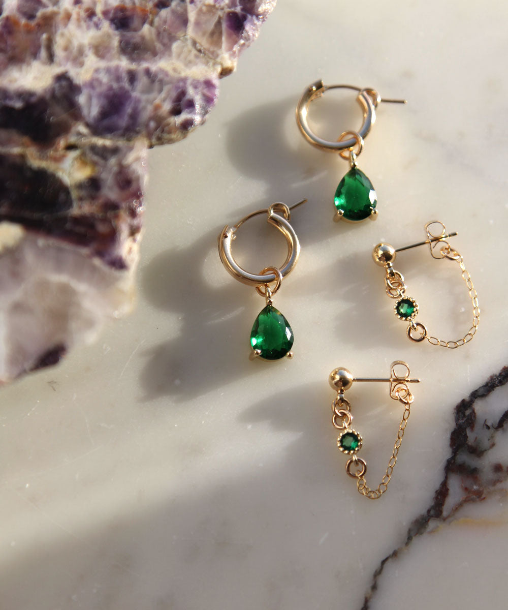 Green earrings set.