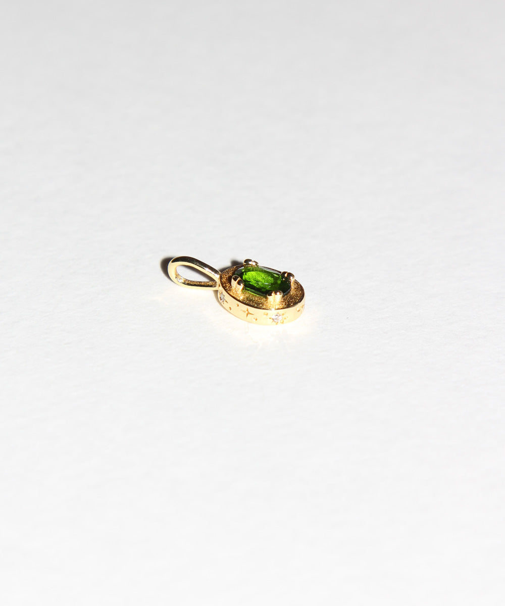 Maison de Femmes May Emerald Birthstone Pendant with cosmic sides.
