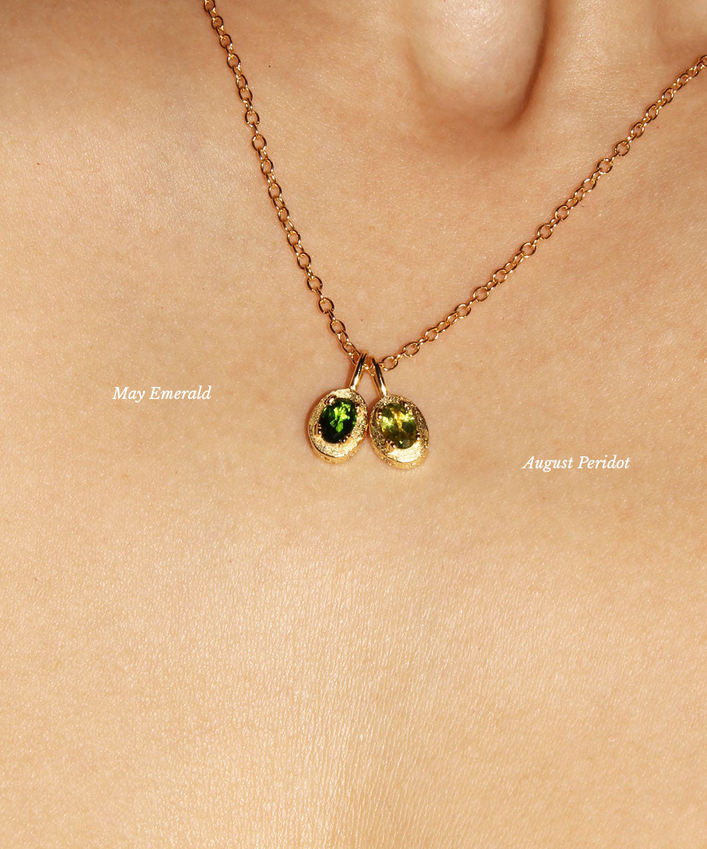 Maison de Femmes gold vermeil May Emerald Birthstone and August Peridot Birthstone Necklace worn by woman.