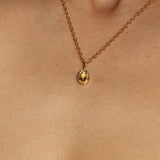 Maison de Femmes gold vermeil November Citrine Birthstone Necklace worn by woman.