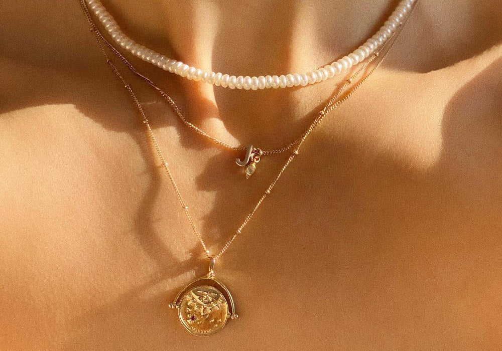 The Secret Meaning Behind Spinner Necklaces: More Than Just A Fidget