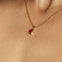 Maison de Femmes gold vermeil July Ruby Birthstone Necklace worn by woman.