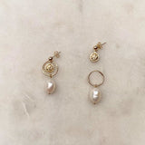 Gold Filled earrings with smiling suns and freshwater pearls.