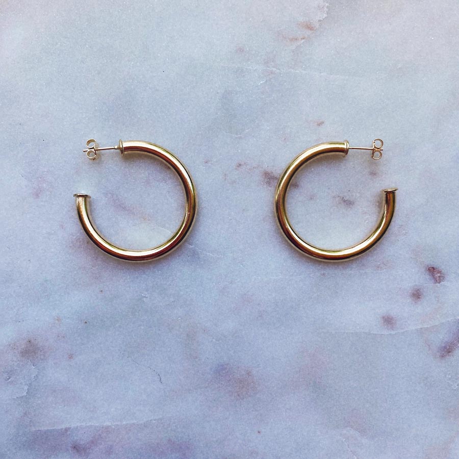 Celine basic gold filled open hoop earrings.