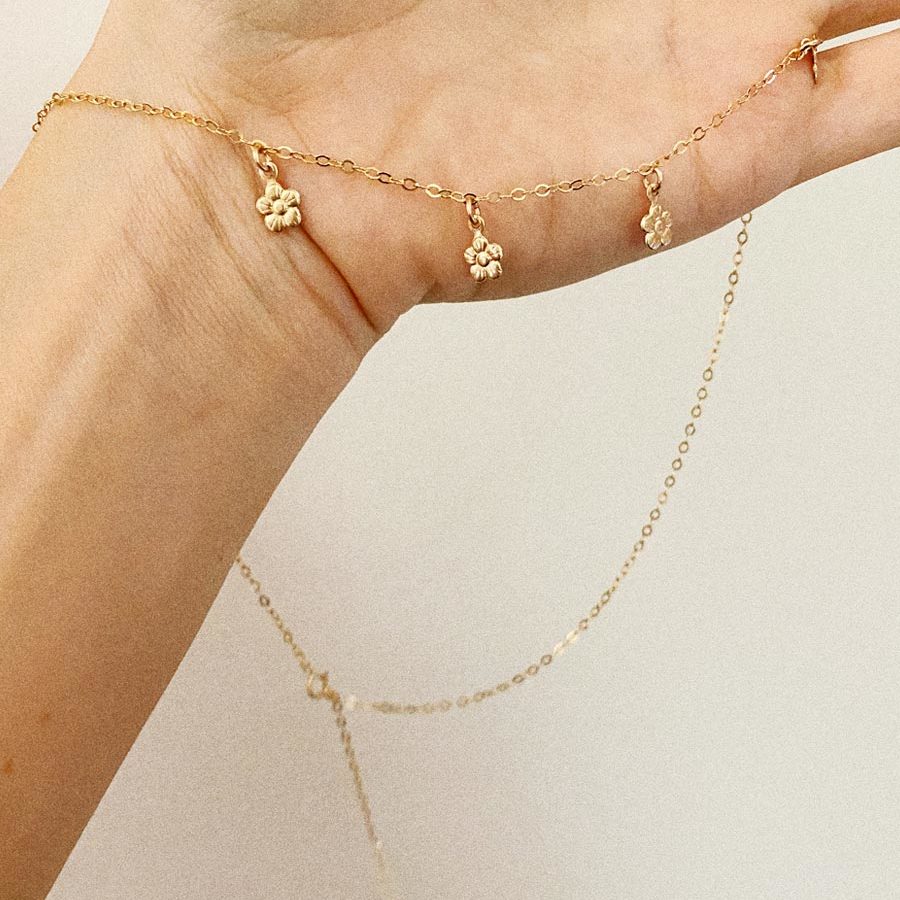 Gold filled daisy chain charm choker necklace.
