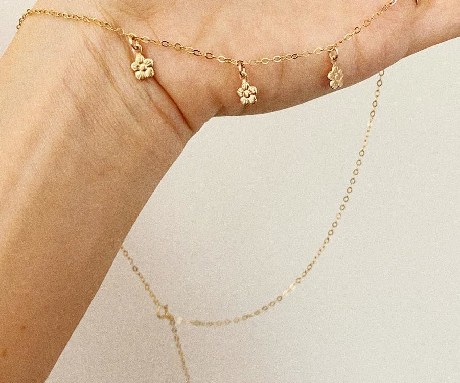Gold filled daisy chain charm choker necklace.