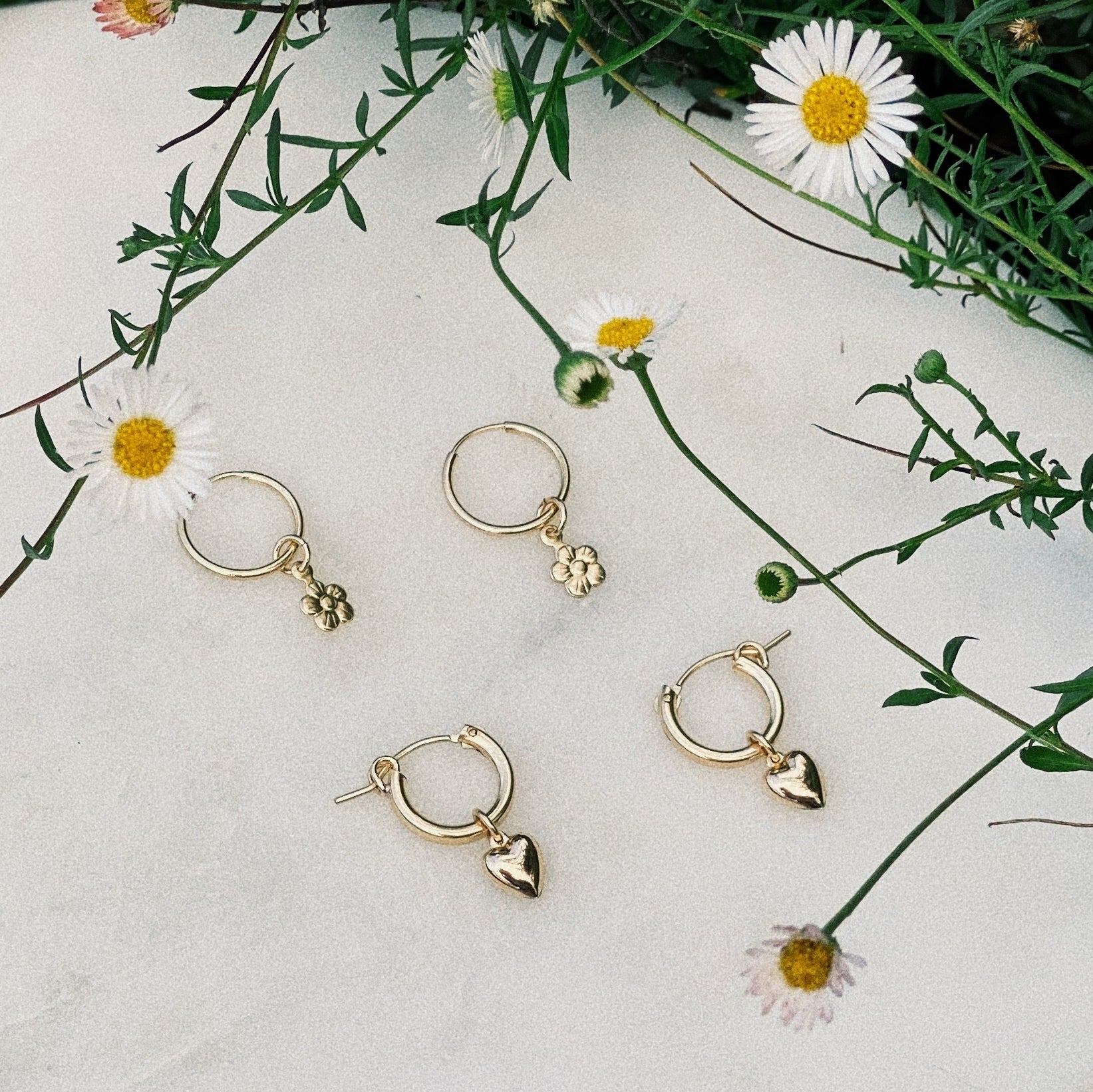 Daisy and Lover earrings.
