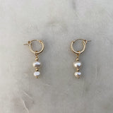 Gold Filled hoop earrings with two freshwater pearls.